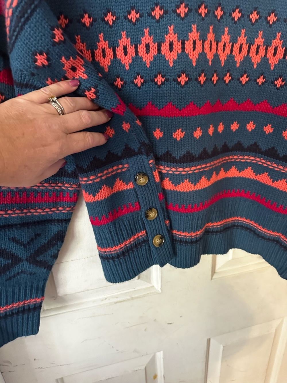 Sundance sweater with two buttons each side